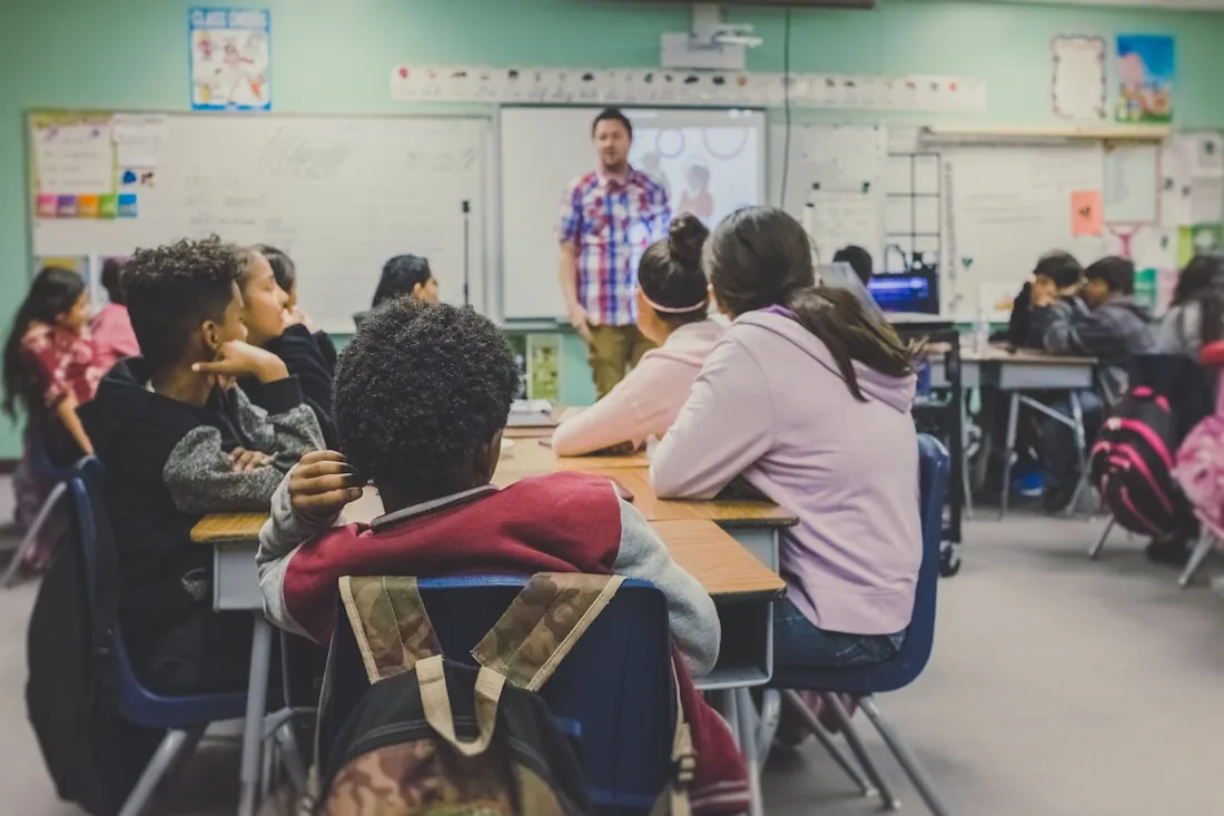 Students seated in a classroom during a lesson