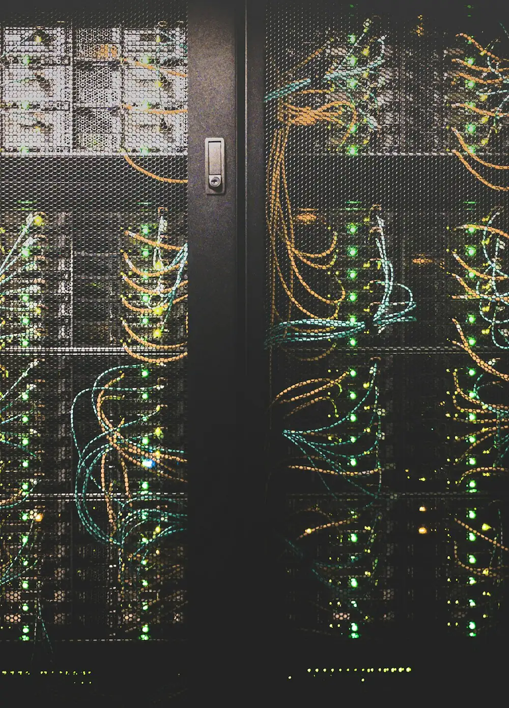 Server racks with structured cabling and status lights