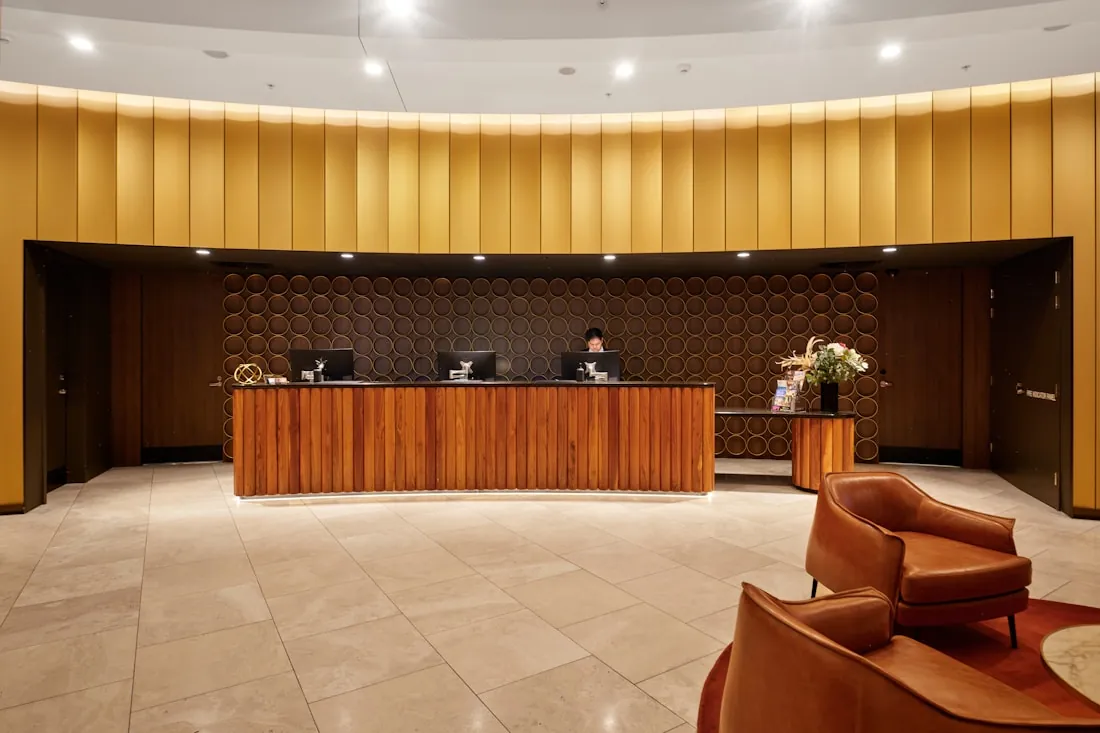 The reception desk at the front of house of a hotel