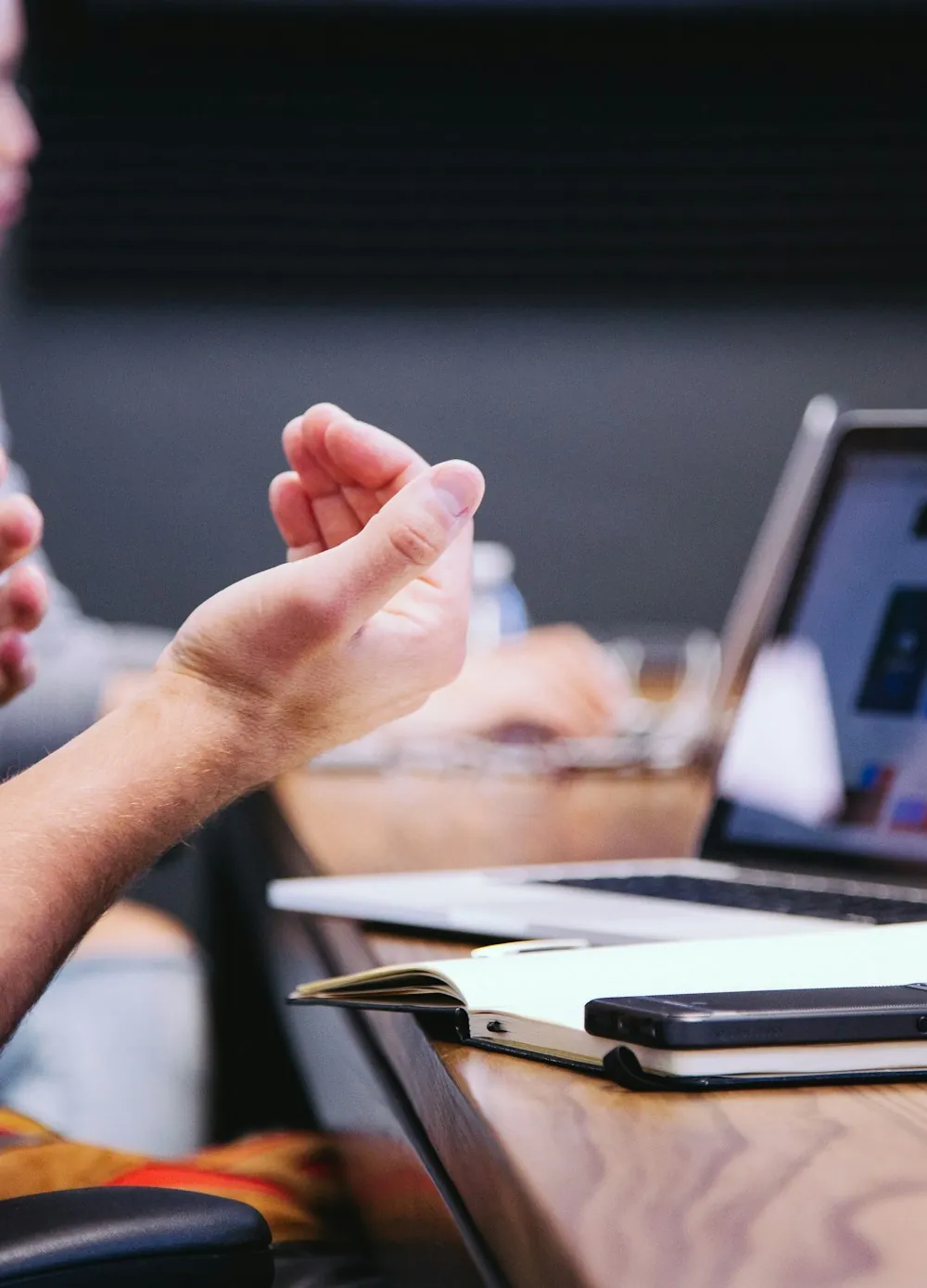 A person talking through an interface on a laptop during a research session