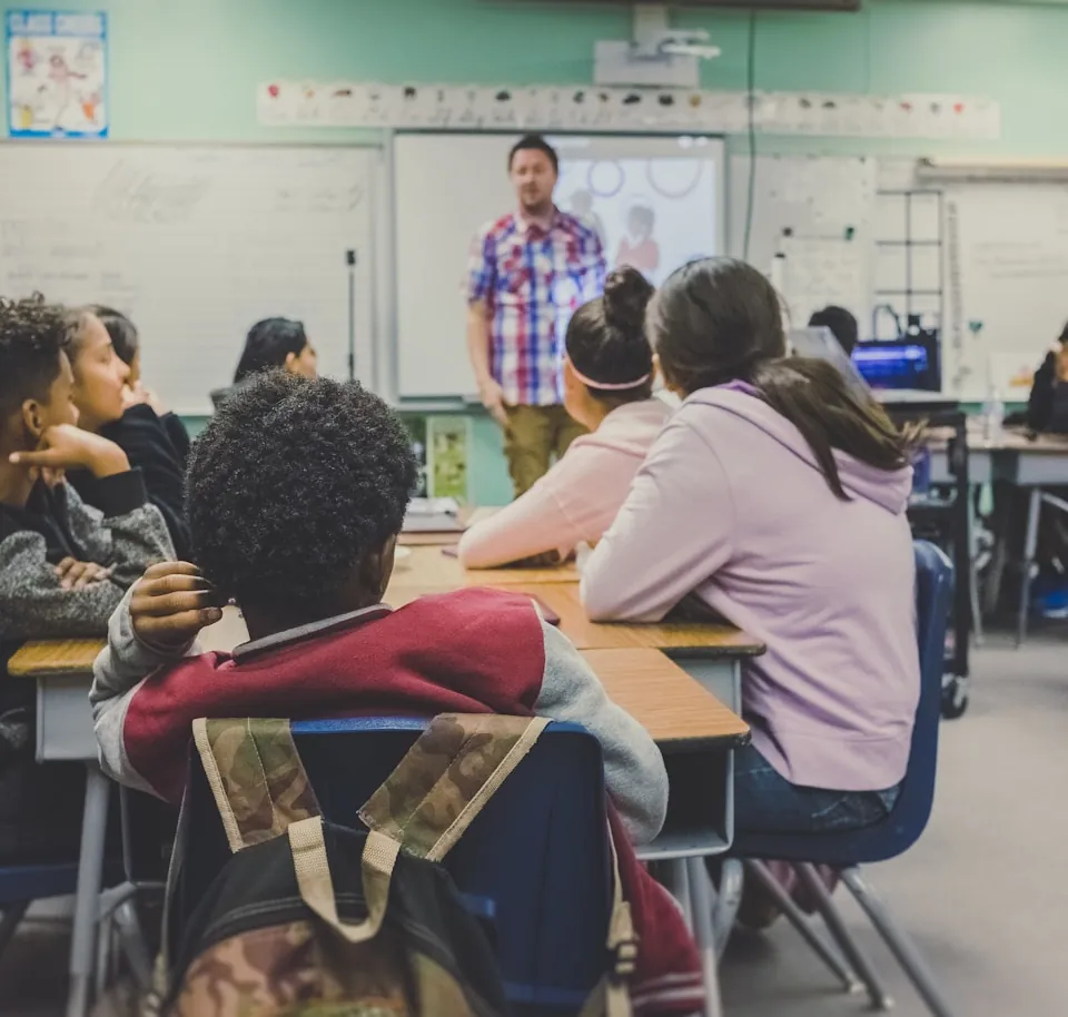 Students seated in a classroom during a lesson