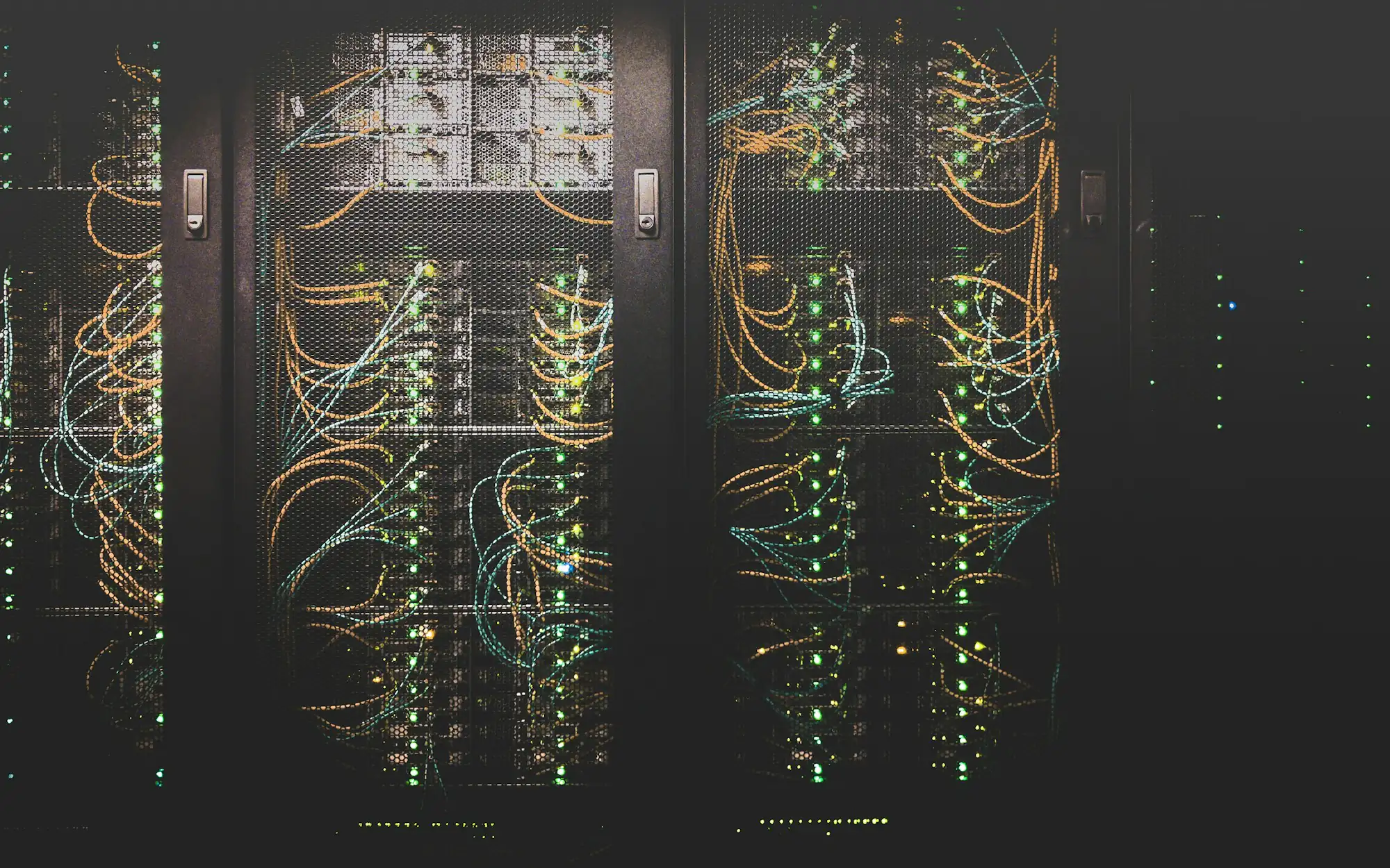 Server racks with structured cabling and status lights